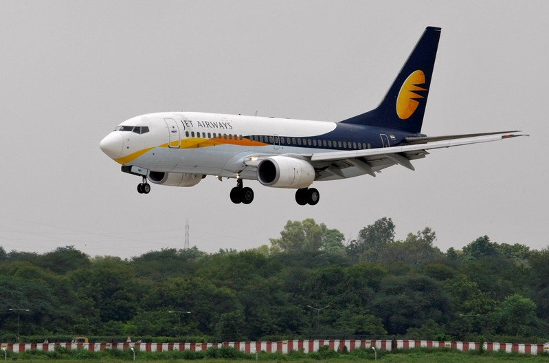 FILE PHOTO: Jet Airways passenger aircraft prepares to land at the airport in the western Indian city of Ahmedabad
