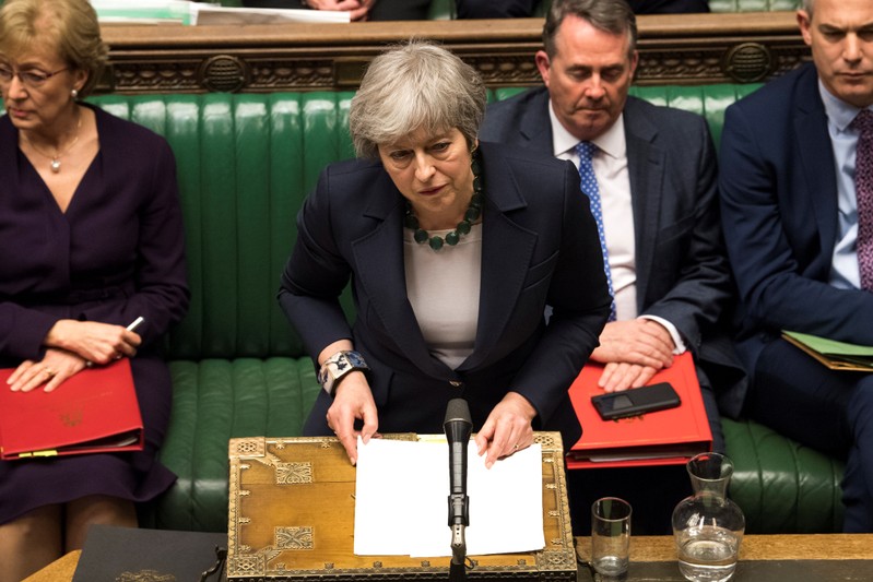 Britain's Prime Minister Theresa May speaks in Parliament following the vote on Brexit in London