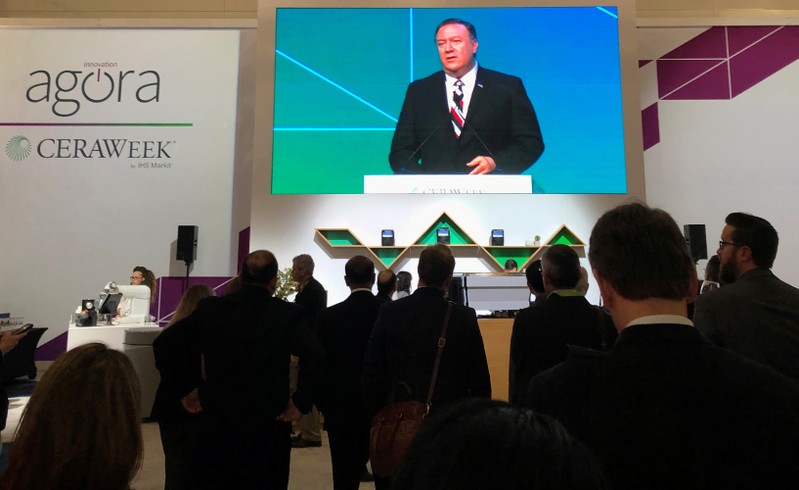 Attendees at IHS Markit’s CERAWeek conference watch the keynote address by U.S. Secretary of State Mike Pompeo from the George Brown Convention Center in Houston