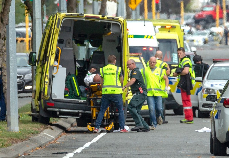 An injured person is loaded into an ambulance following a shooting at the Al Noor mosque in Christchurch