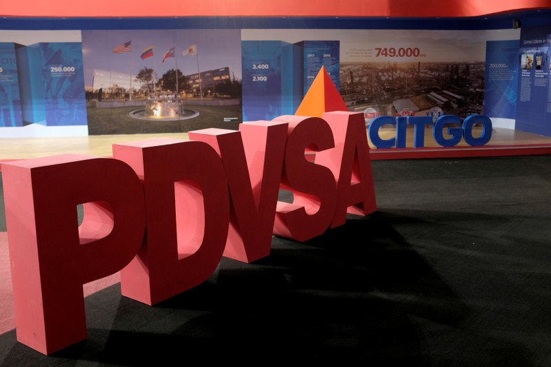 FILE PHOTO: FILE PHOTO: The corporate logos of the state oil company PDVSA and Citgo Petroleum Corp are seen in Caracas