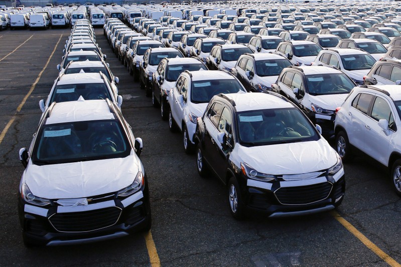 FILE PHOTO: Imported automobiles are parked in a lot at the port of Newark New Jersey