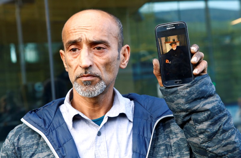 Omar Nabi speaks to the media about losing his father Haji Daoud in the mosque attacks, at the district court in Christchurch
