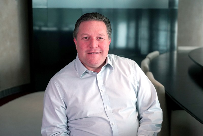 FILE PHOTO: McLaren team principal Zak Brown, poses for a photograph at the McLaren Technology Centre in Woking