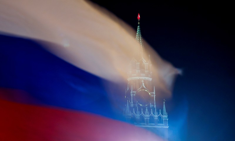 FILE PHOTO: A Russian flag flies with the Spasskaya tower of Moscow's Kremlin in the background