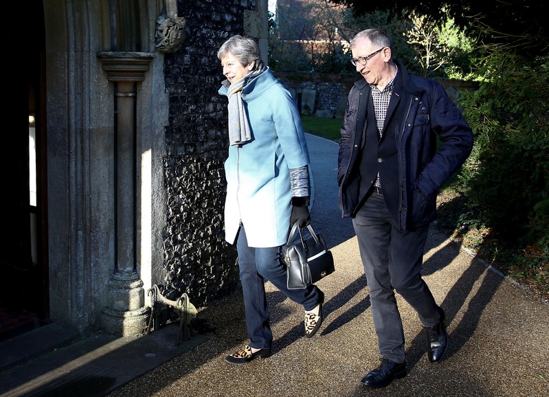 Britain's Prime Minister Theresa May and her husband Philip arrive at church in Sonning