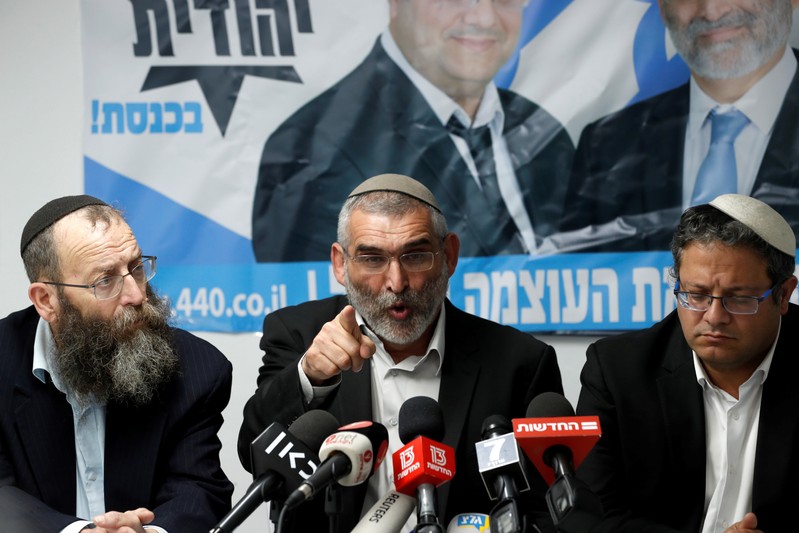 Michael Ben-Ari from the Jewish Power party delivers a statement to the media together with his party's members, Baruch Marzel and Itamar Ben-Gvir in Jerusalem