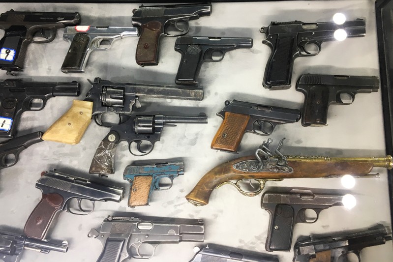 FILE PHOTO: Weapons the government says were seized from militants in Xinjiang are on display at an exhibition titled