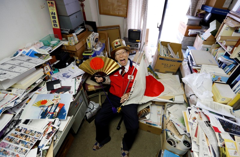 FILE PHOTO: Naotoshi Yamada poses for a photo at his office in Tokyo