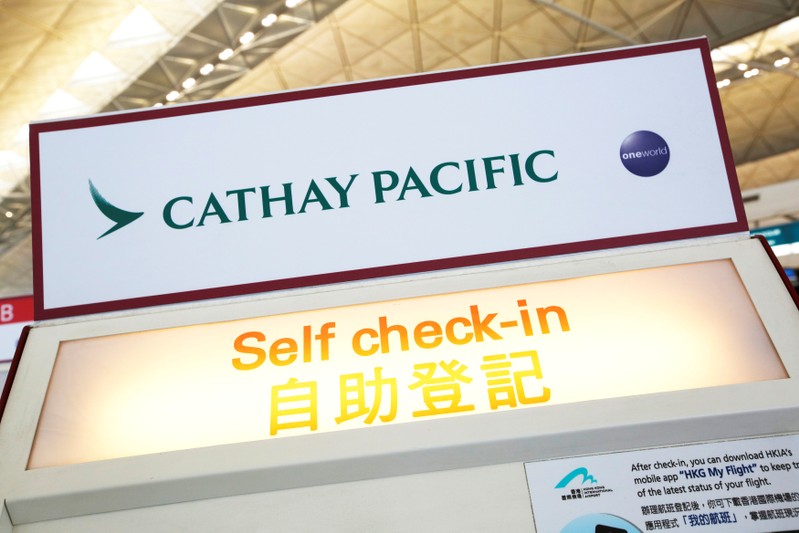 FILE PHOTO: A Cathay Pacific self check-in machine is displayed at Hong Kong Airport