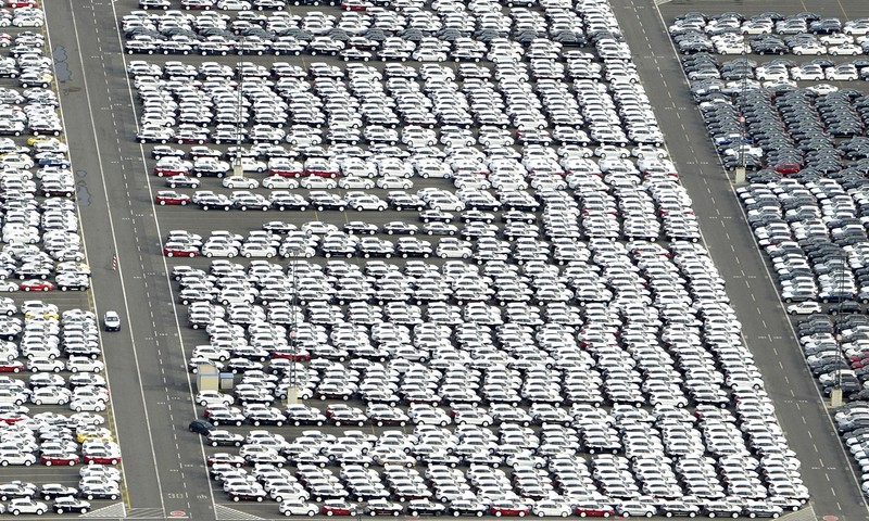 Cars for export stand in shipping terminal at harbour in Bremerhaven