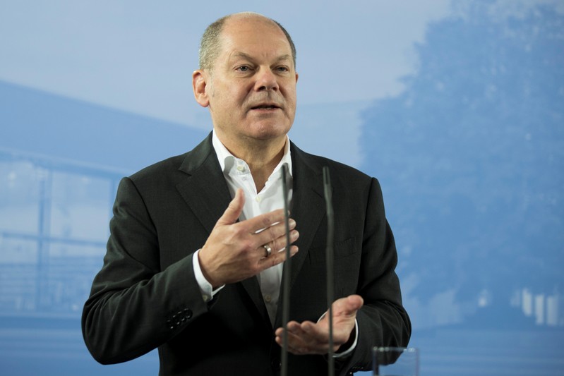 German Finance Minister Olaf Scholz attends a press conference after the federal cabinet meeting in Potsdam