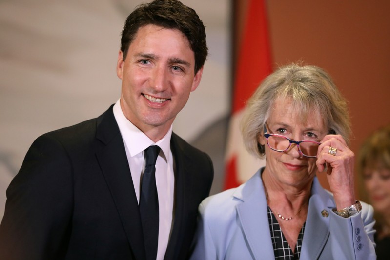 Canada's Prime Minister Justin Trudeau poses with Joyce Murray after she was sworn-in during a cabinet shuffle at Rideau Hall in Ottawa
