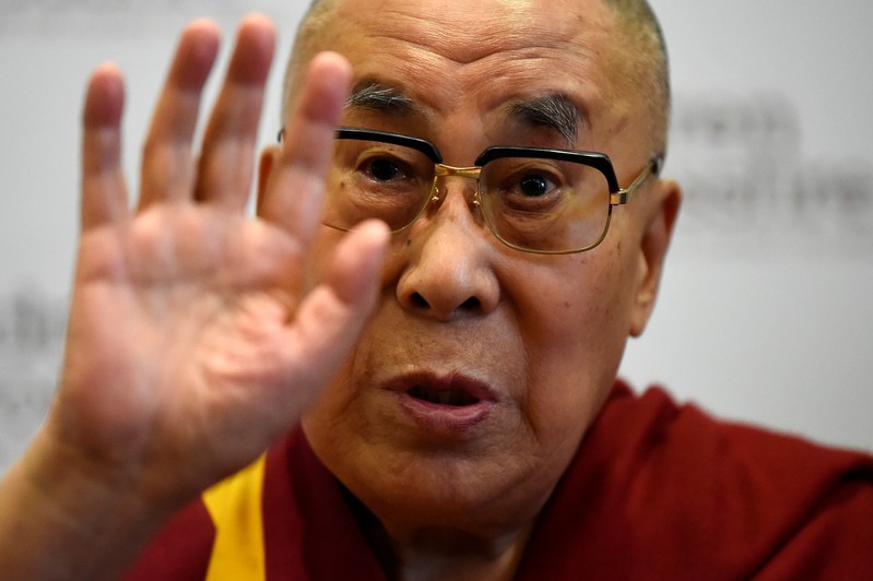 FILE PHOTO: Tibetan spiritual leader the Dalai Lama, Patron of Children in Crossfire, speaks during a press conference in Londonderry