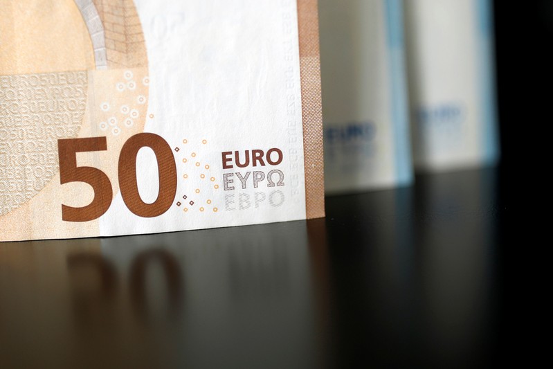 50 and 20 Euro banknotes are displayed in this picture illustration