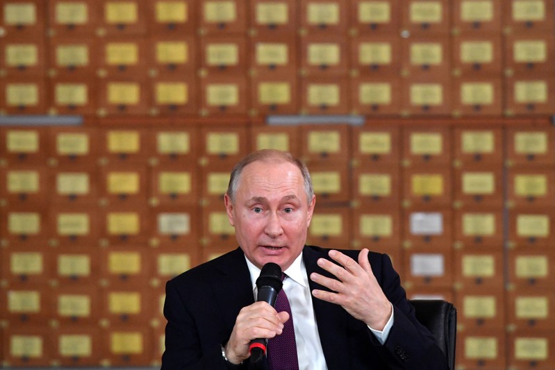 Russian President Vladimir Putin meets with members of the public in Simferopol