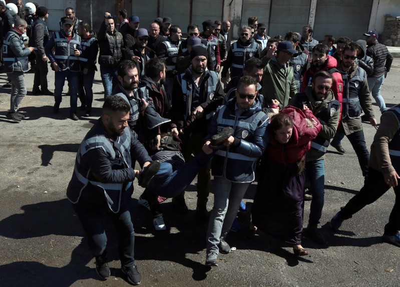 Turkish police detain demonstrators as they protest the death of a Kurdish inmate, in Diyarbakir