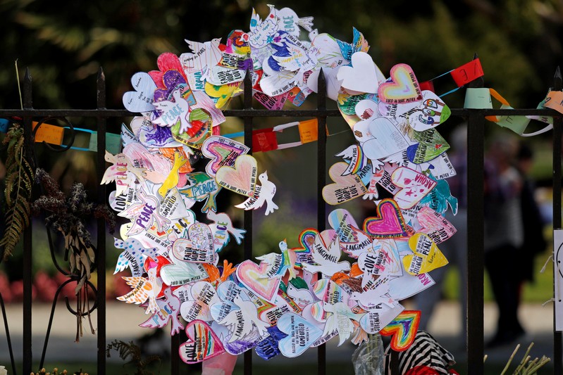 Messages are seen a memorial site for victims of Friday's shooting, in front of Christchurch Botanic Gardens in Christchurch