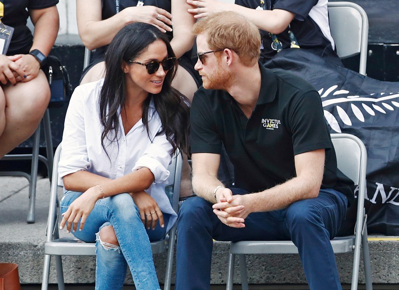 FILE PHOTO: Britain's Prince Harry arrives with girlfriend actress Meghan Markle at the wheelchair tennis event during the Invictus Games in Toronto