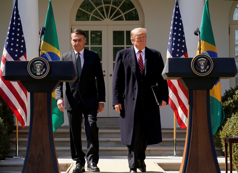 U.S. President Donald Trump and Brazil's President Jair Bolsonaro hold a joint news conference at the White House in Washington