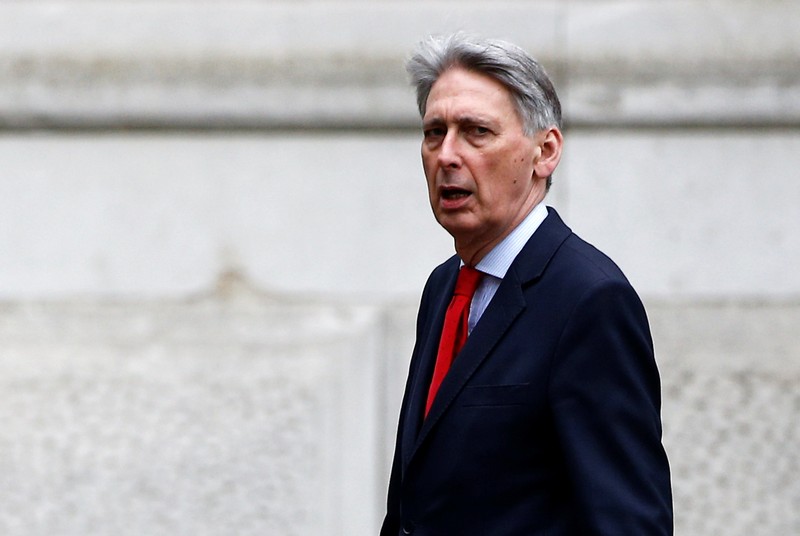 Britain's Chancellor of the Exchequer Philip Hammond is seen outside Downing Street in London
