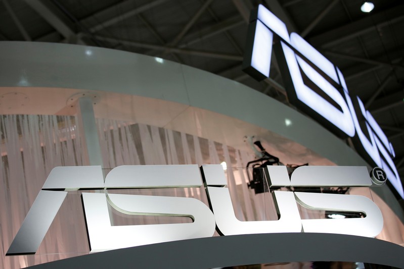 Logos of Taiwanese multinational computer hardware and electronics company Asus are seen during the annual Computex computer exhibition in Taipei