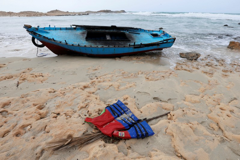 FILE PHOTO: A boat used by migrants is seen near the western town of Sabratha