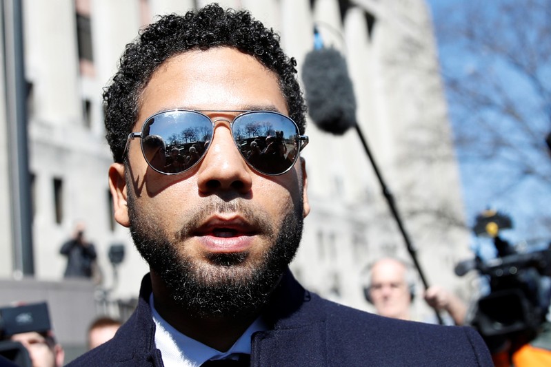 Actor Jussie Smollett leaves court after charges against him were dropped by state prosecutors in Chicago