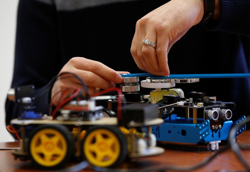 FILE PHOTO: A research support officer and PhD student works on his artificial intelligence projects to train robots to autonomously carry out various tasks, at the Department of Artificial Intelligence at the University of Malta in Msida