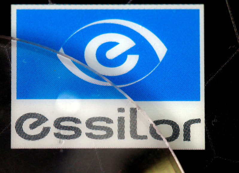 FILE PHOTO: Lens producers Essilor' s logo is seen in an optician shop in Paris