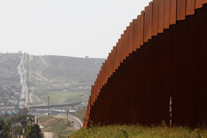 The border fence between Mexico and the United States is pictured from Tijuana