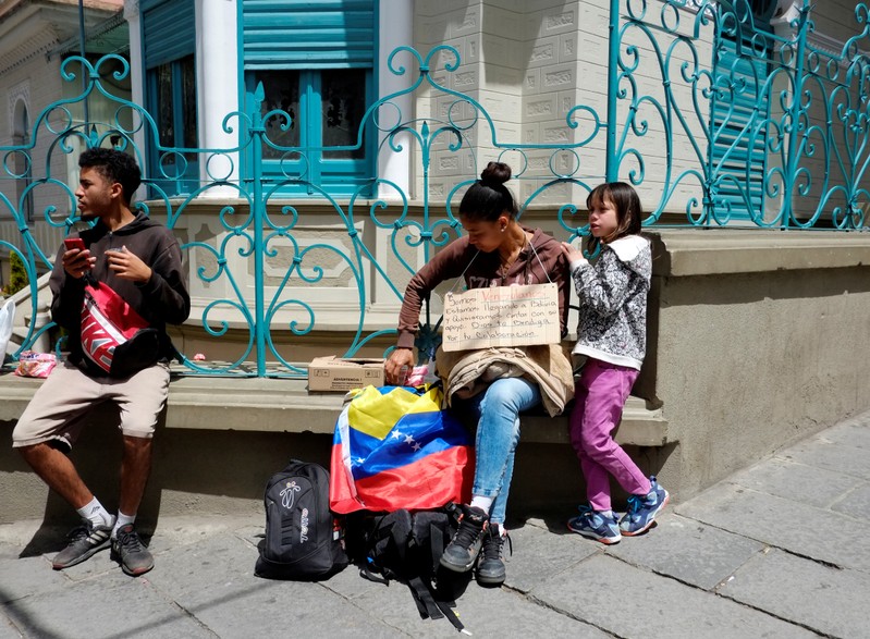 Venezuelan migrants are seen in the centre of La Paz