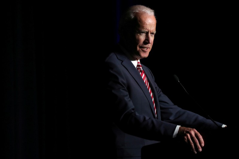 FILE PHOTO: U.S. former Vice President Biden delivers remarks at the First State Democratic Dinner in Dover, Delaware