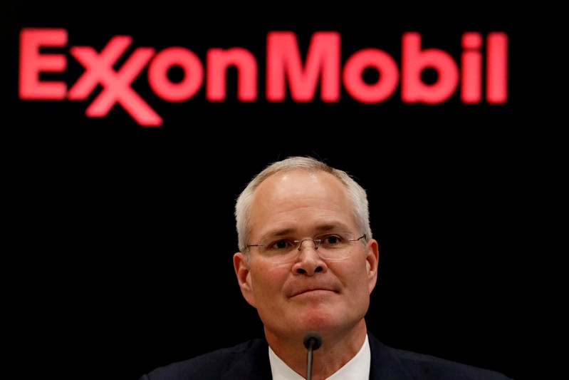 FILE PHOTO: Darren Woods, chairman & CEO, Exxon Mobil Corp, attends a news conference at the NYSE