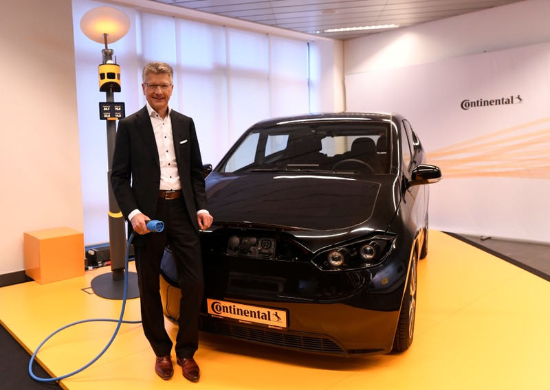 FILE PHOTO: Elmar Degenhart, CEO of German tyre company Continental poses for the media before the annual news conference in Hanover