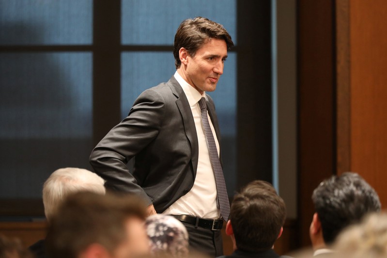 Canada's PM Trudeau waits to address a Liberal Party caucus meeting on Parliament Hill in Ottawa