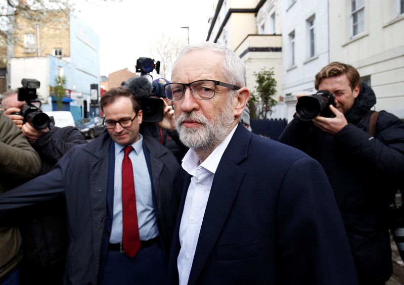 British opposition Labour Party leader Jeremy Corbyn leaves his home in London