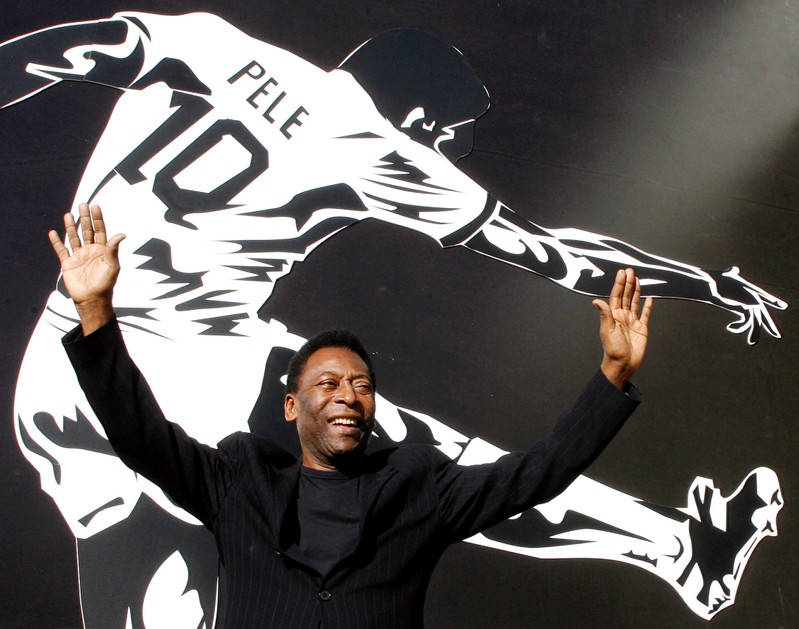 FILE PHOTO: Brazilian soccer legend Pele poses for photographers before news conference in Brasília
