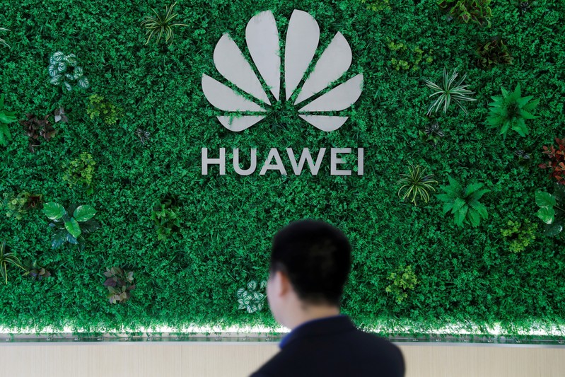 The Logo of Huawei is seen at its showroom in Shenzhen, Guangdong province