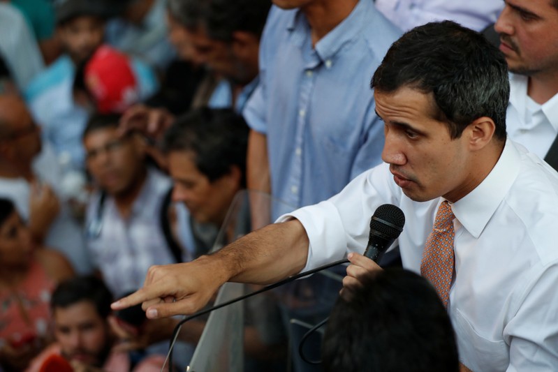 Venezuelan opposition leader Guaido speaks to supporters during a gathering in Caracas