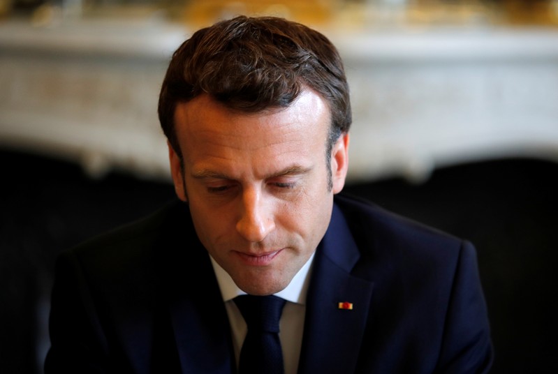 French President Emmanuel Macron meets representatives of an association of Rwanda genocide survivors, Ibuka France, at the Elysee Palace in Paris