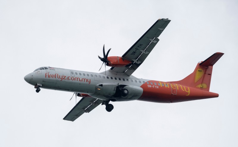 A Firefly ATR 72-500 airplane approaches to land at Changi International Airport in Singapore