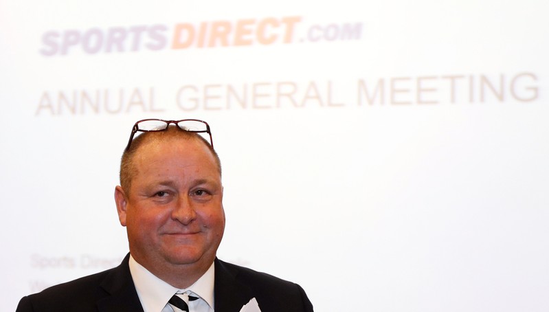 FILE PHOTO: Mike Ashley, founder and majority shareholder of sportwear retailer Sports Direct, arrives at the company's AGM, at the company's headquarters in Shirebrook