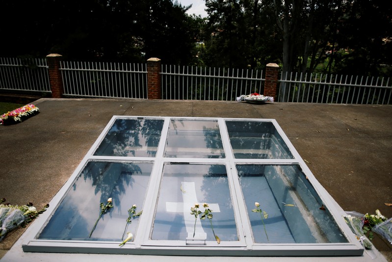 Flowers are seen on a grave site for victims of the Rwandan genocide at the Genocide Memorial in Gisozi in Kigali