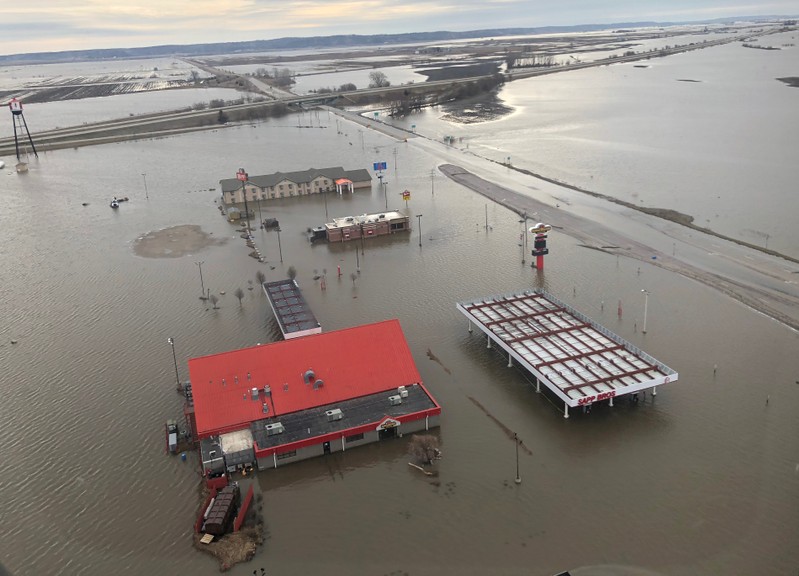 FILE PHOTO: A motel, restaurant and travel stop are shown surrounded by flood waters in this aerial photo in Percival, Iowa