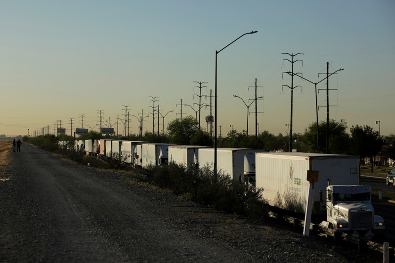 Trucks wait in queue for border customs control to cross into the U.S. at the Cordova-Americas border crossing bridge in Ciudad Juarez