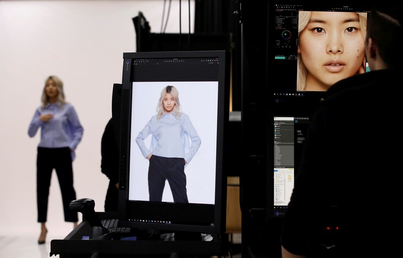 FILE PHOTO: A model is seen during a shooting session for Amazon Fashion at an unveiling of its new photo studio in Tokyo