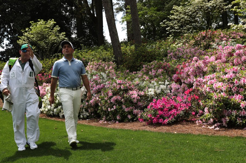 Francesco Molinari of Italy walks down the 6th fairway during practice for the 2019 Masters golf tournament at the Augusta National Golf Club in Augusta, Georgia, U.S.