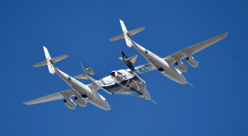 Virgin Galactic rocket plane, the WhiteKnightTwo carrier airplane, with SpaceShipTwo passenger craft takes off from Mojave Air and Space Port