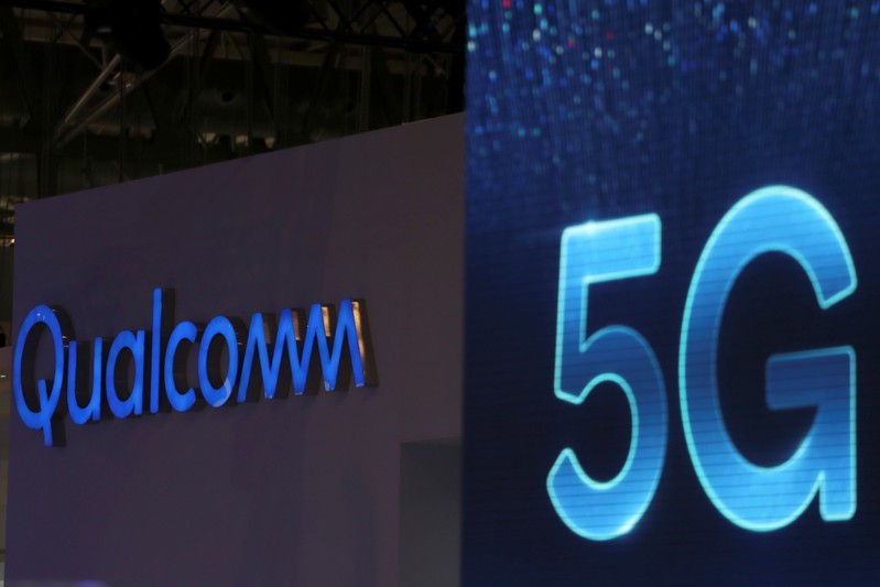 FILE PHOTO: Qualcomm and 5G logos are seen at the Mobile World Congress in Barcelona